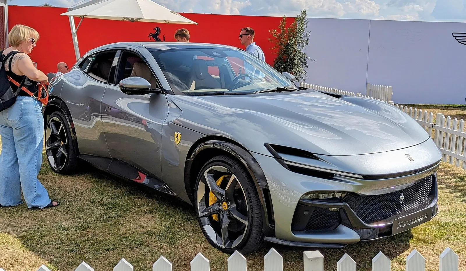 Silver Ferrari Purosangue on display, front three-quarter view